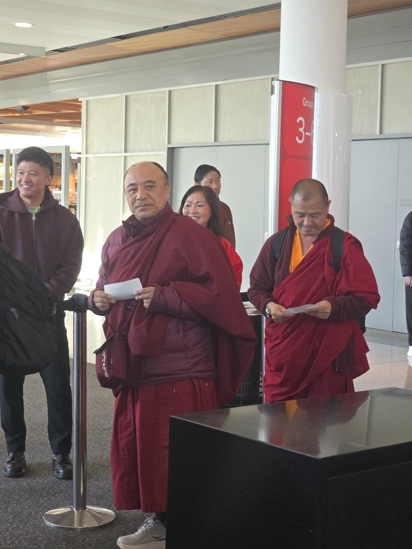 Kyabje Namkhai Nyingpo Rinpoche preparing to depart through the terminal at Canberra Airport